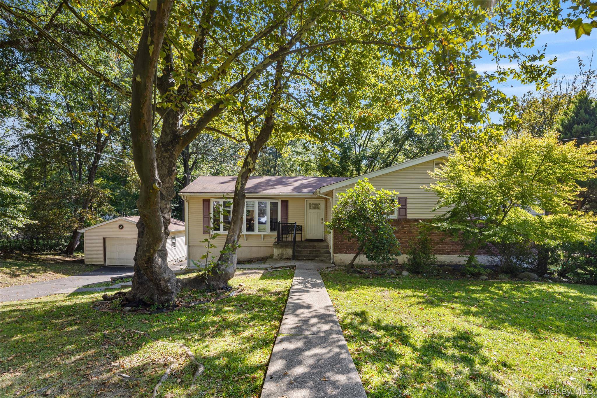 Welcome to this beautifully updated ranch home, perfectly situated on a large, flat lot in one of the most sought after neighborhoods.