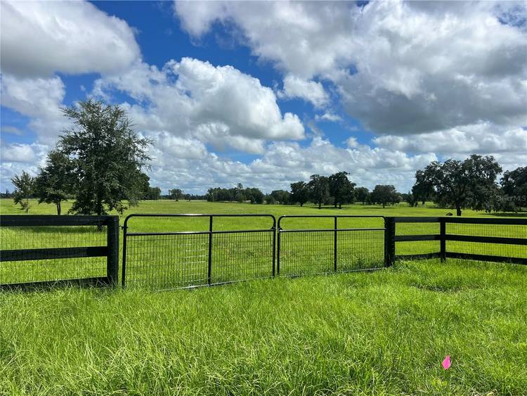 Beautiful 20. 01 acres with established grass and large oak trees in a sought after location in NW Marion County.