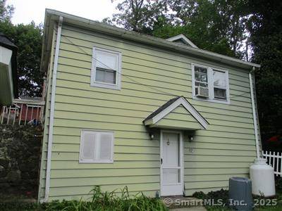 One of a kind property, dwellings built by owners' grandfather.