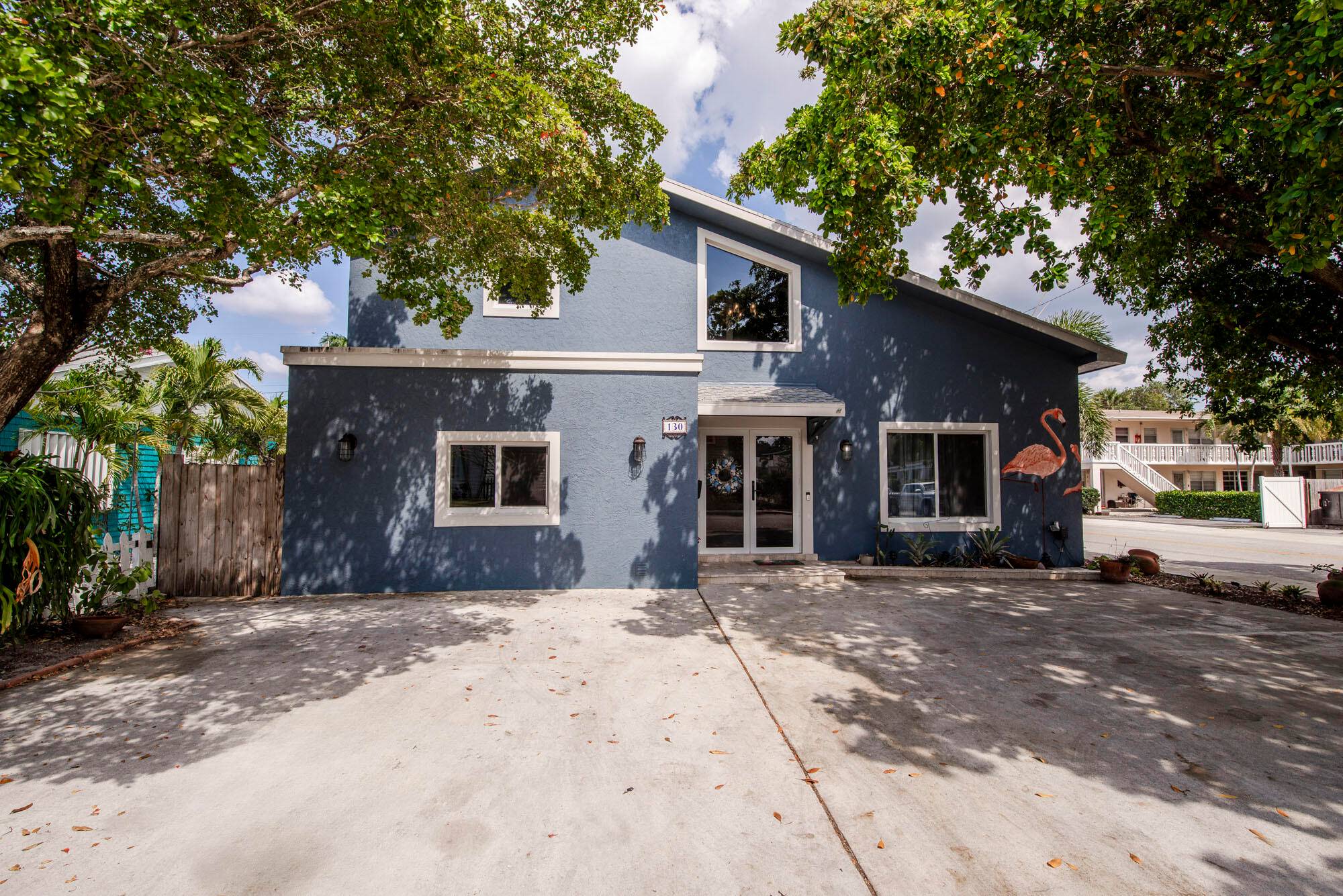 This luxurious Spanish style retreat in the heart of downtown Lake Worth Beach offers the perfect blend of charm and convenience.