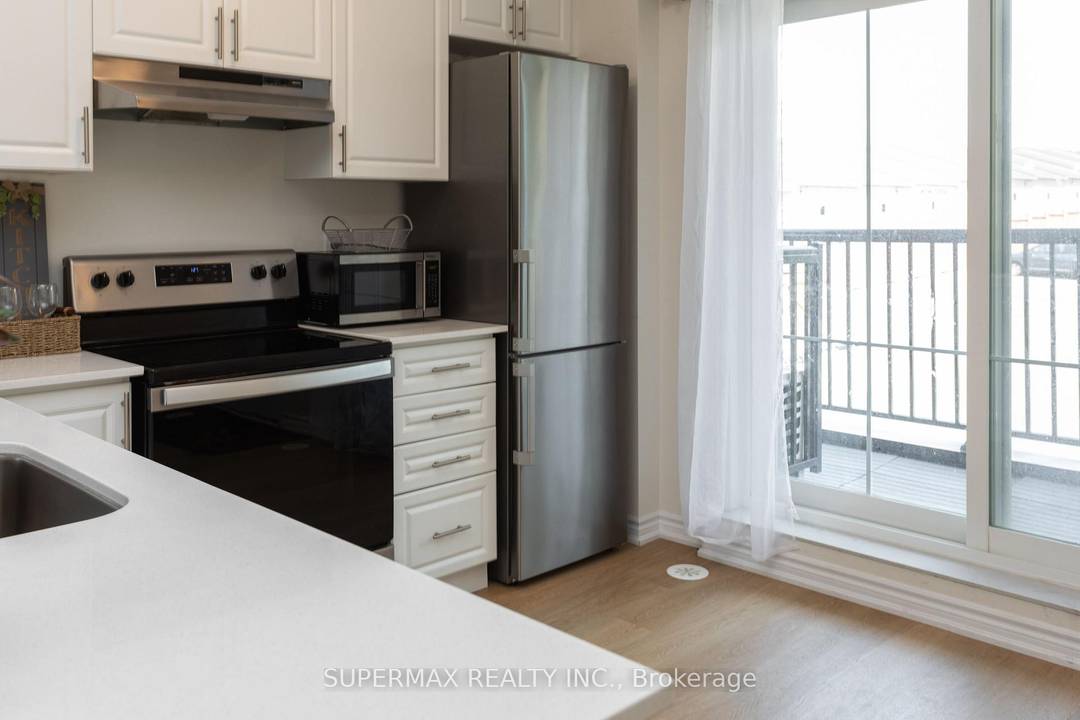 Welcome to this neat amp ; clean spacious 2 bedrooms amp ; 2 washrooms stacked condo townhouse.