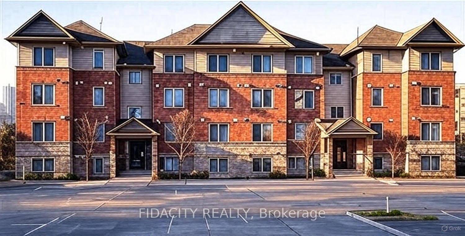 Investment Opportunity Spacious ground level condo featuring an open concept layout with a walk out patio to private outdoor space and beautifully maintained common greenspace.