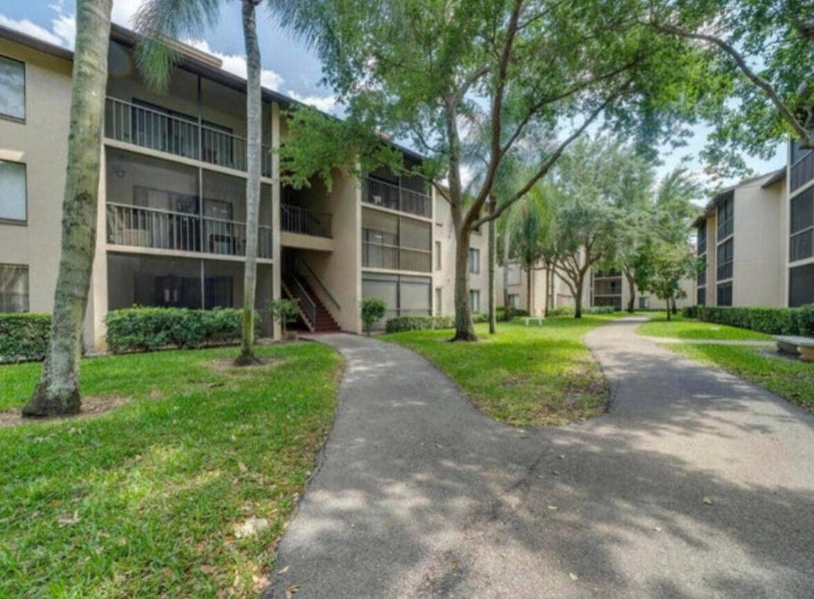 Welcome Home to this beautiful and totally remodeled ground floor unit, kitchen and bathrooms redone, stainless steel appliances and quartz countertops.