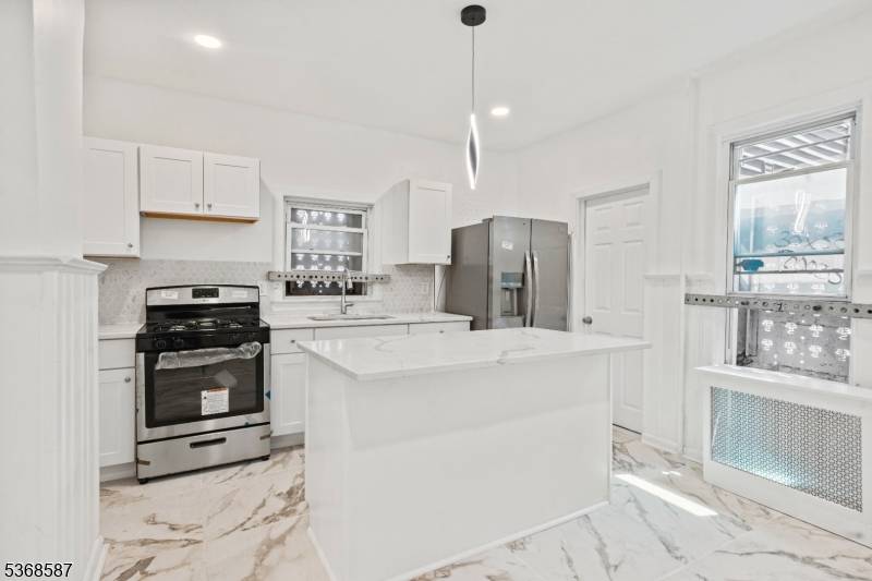 Charming Updated Home with Modern Touches Throughout !