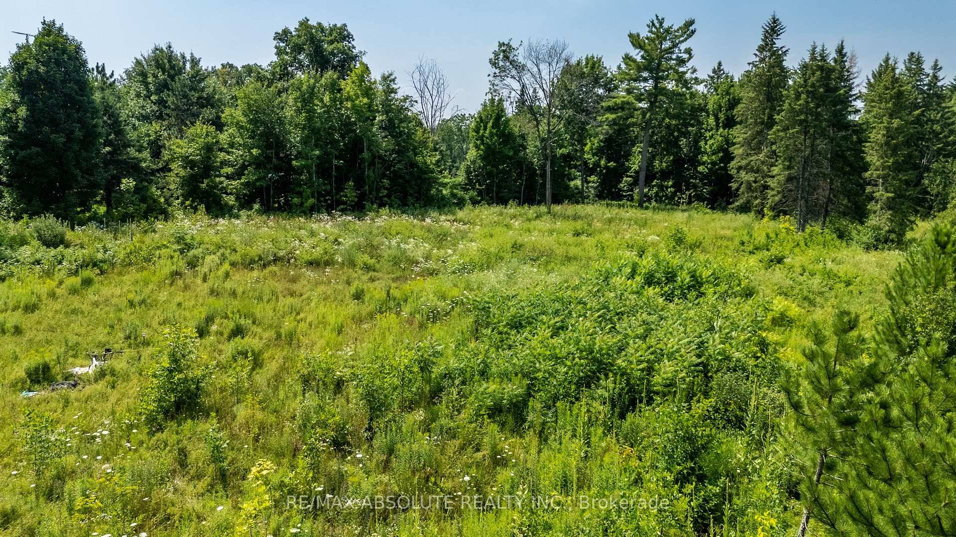 Build your dream retreat at 1886 March Road, Ottawa a scenic 2 acre parcel in Kanatas desirable west end, surrounded by Beachvale and Marchvale Estates.