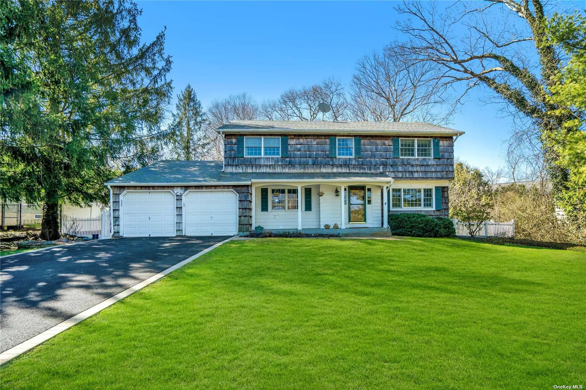 Welcome Home to this Spectacular Center Hall Colonial in the heart of the Three Village School District.