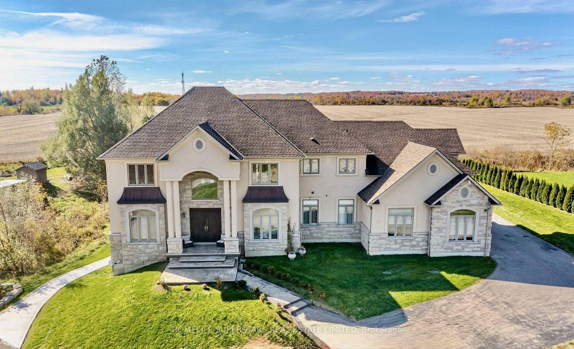 Welcome to this luxurious custom estate, offering an unparalleled blend of rural tranquility and urban convenience.