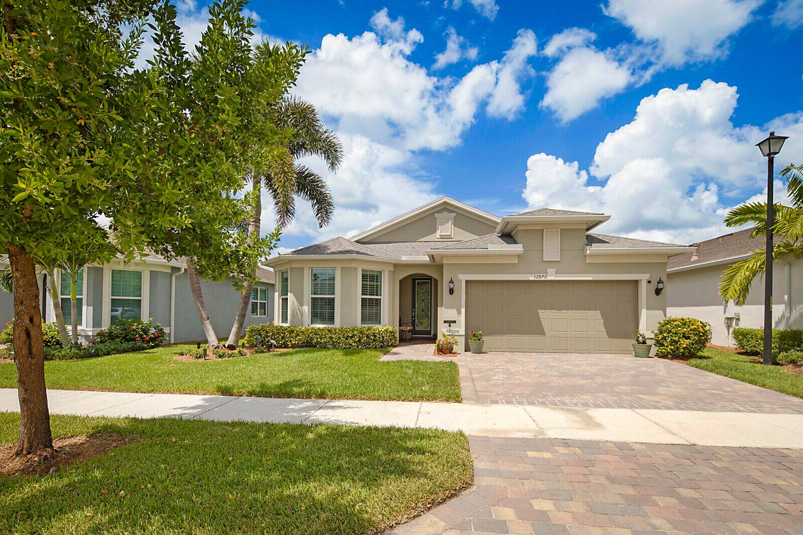 Experience Florida living at its finest in this beautifully upgraded Summerwood model in the sought after Del Webb Tradition 55 community.