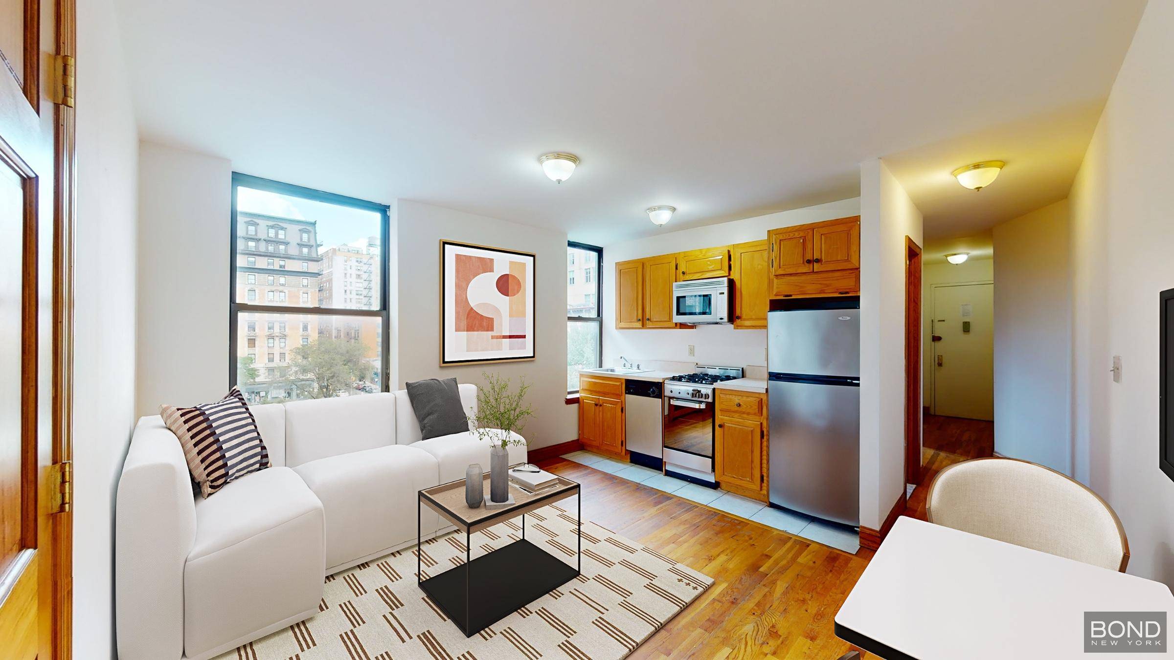 Absolutely charming two bedroom home features a spacious living room, an open kitchen with stainless steel appliances including a dishwasher !