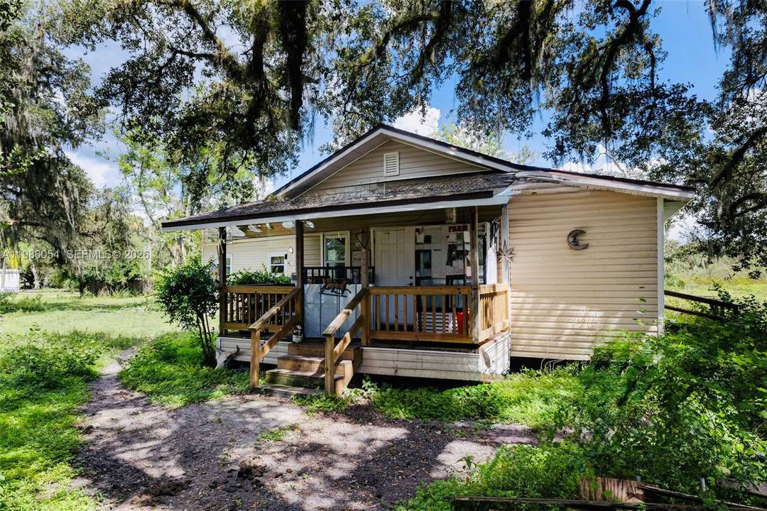 OPEN TO OFFERS ! ! ! Discover the potential of this unique property located along N US Highway 27 in peaceful Palmdale, FL.