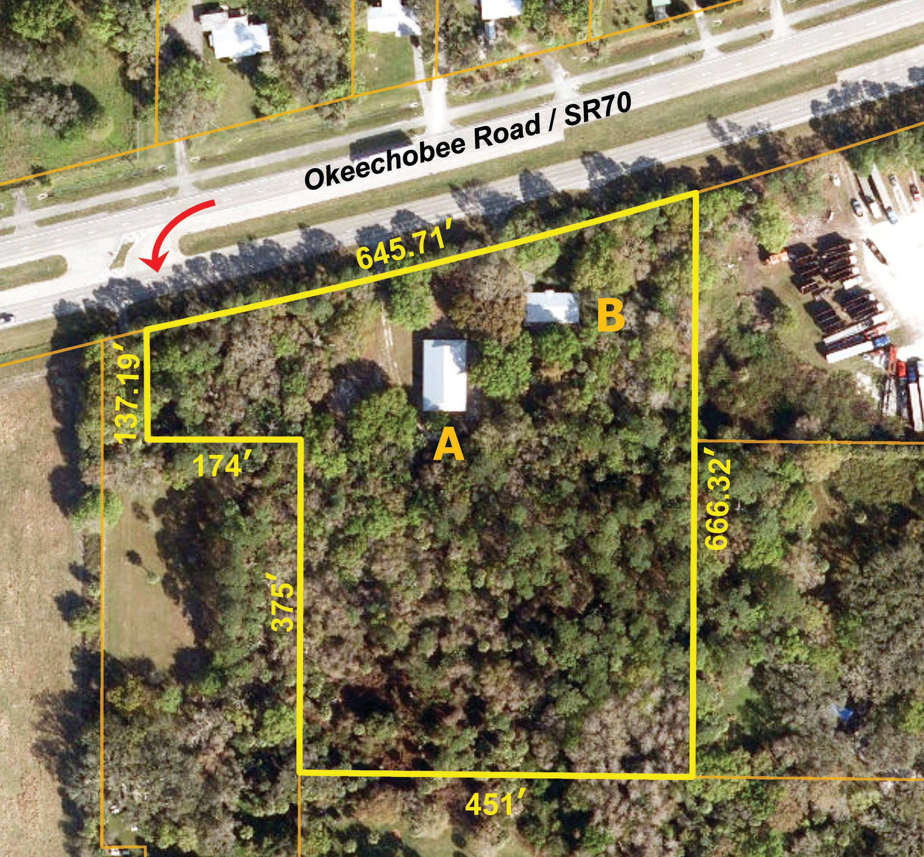 Home or Office plus versatile Shop building on wooded acreage.