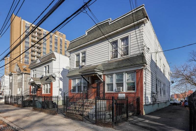 A Must see FOURPLEX UNITS Investor dream TURN KEY income producing property with with lots of upside, 4 residential apartments with exceptional possibilities within minutes from Downtown Newark and airport.