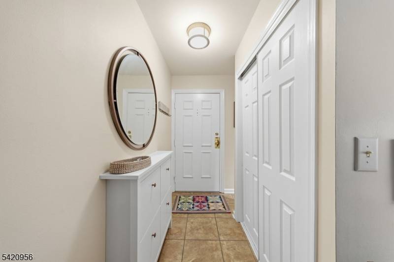 Tucked into the sought after Basking Ridge section of Bernards Township, this inviting condominium offers a warm, comfortable lifestyle with a sense of privacy, surrounded by a peaceful wooded setting.