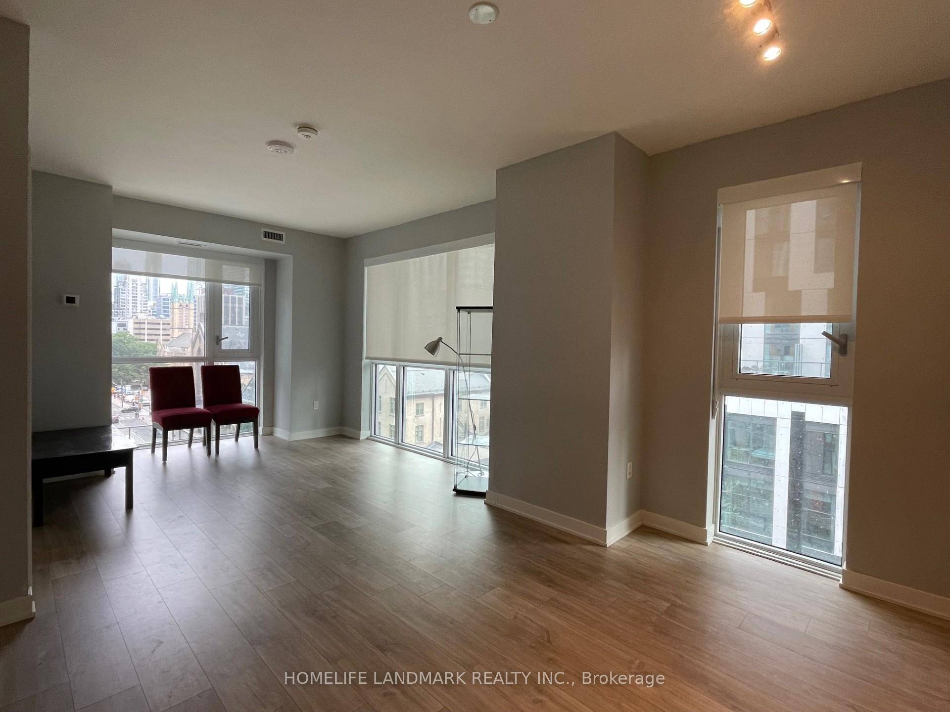 Bright and Spacious Southwest Corner Unit in Prime Downtown Location !
