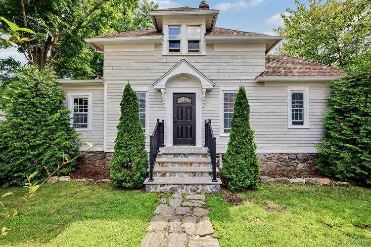 Welcome to this pristine 2 bedroom Cape Cod style home, offering a versatile layout that effortlessly lives like a 3 bedroom.