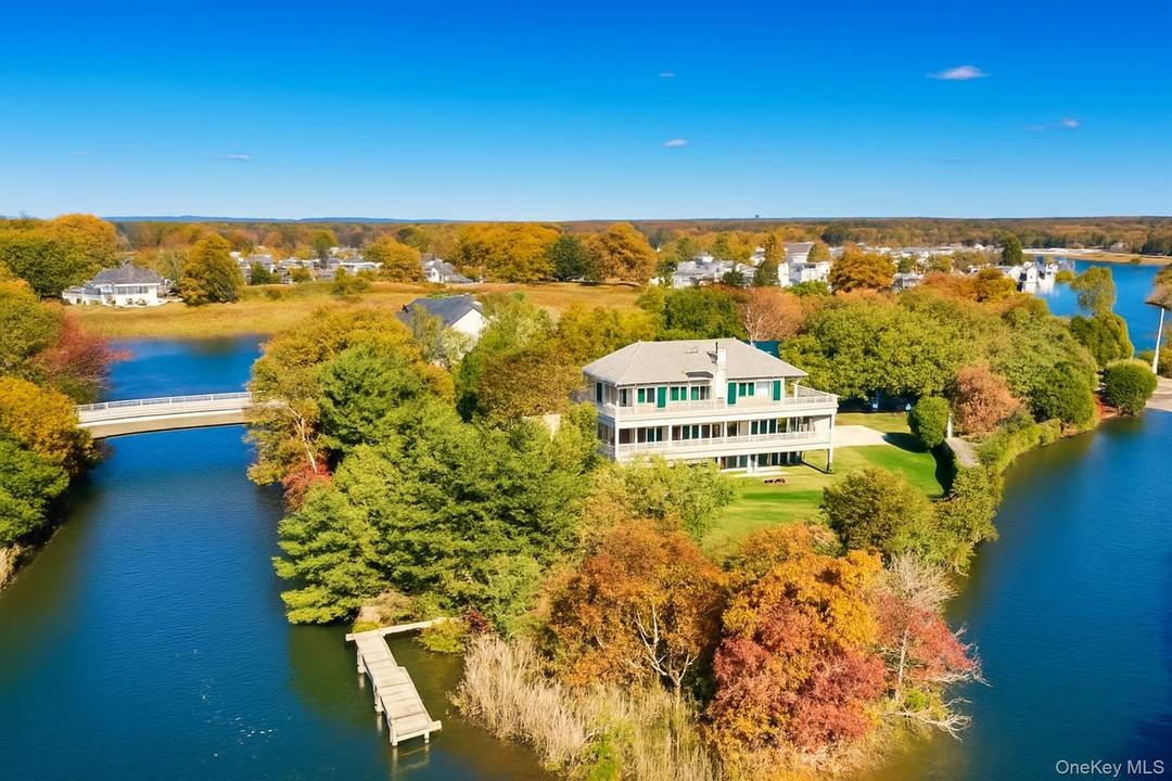 Beautiful and immaculate three story waterfront home offering over 5, 000 square feet of luxury living space with spectacular views of the Connetquot River and Marina.