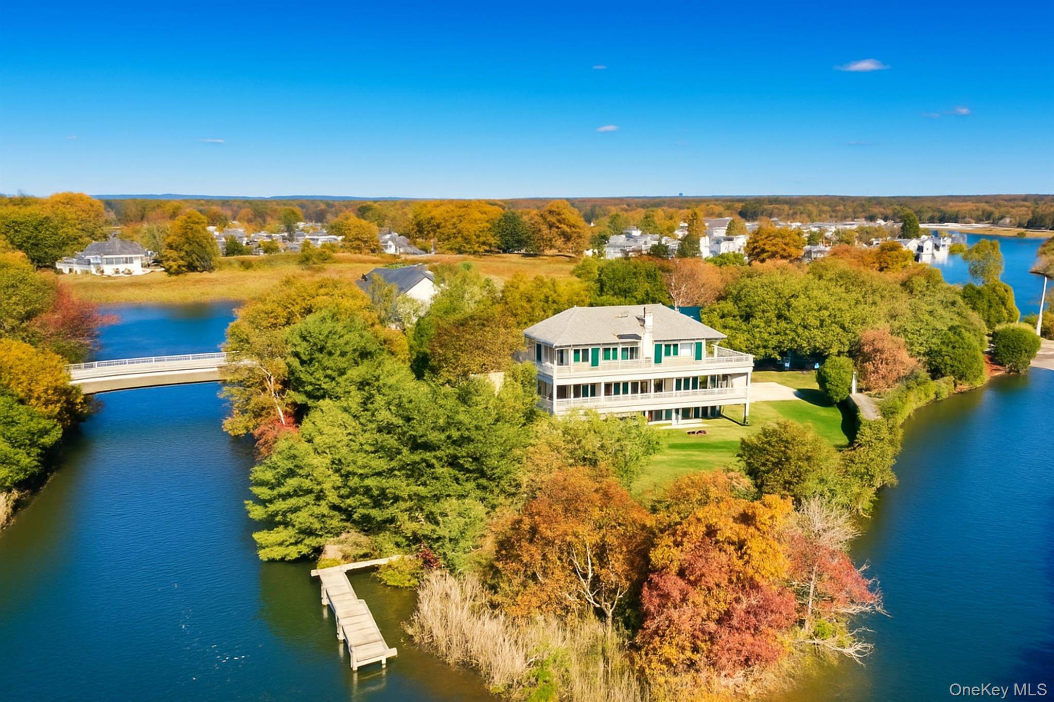Beautiful and immaculate three story waterfront home offering over 5, 000 square feet of luxury living space with spectacular views of the Connetquot River and Marina.