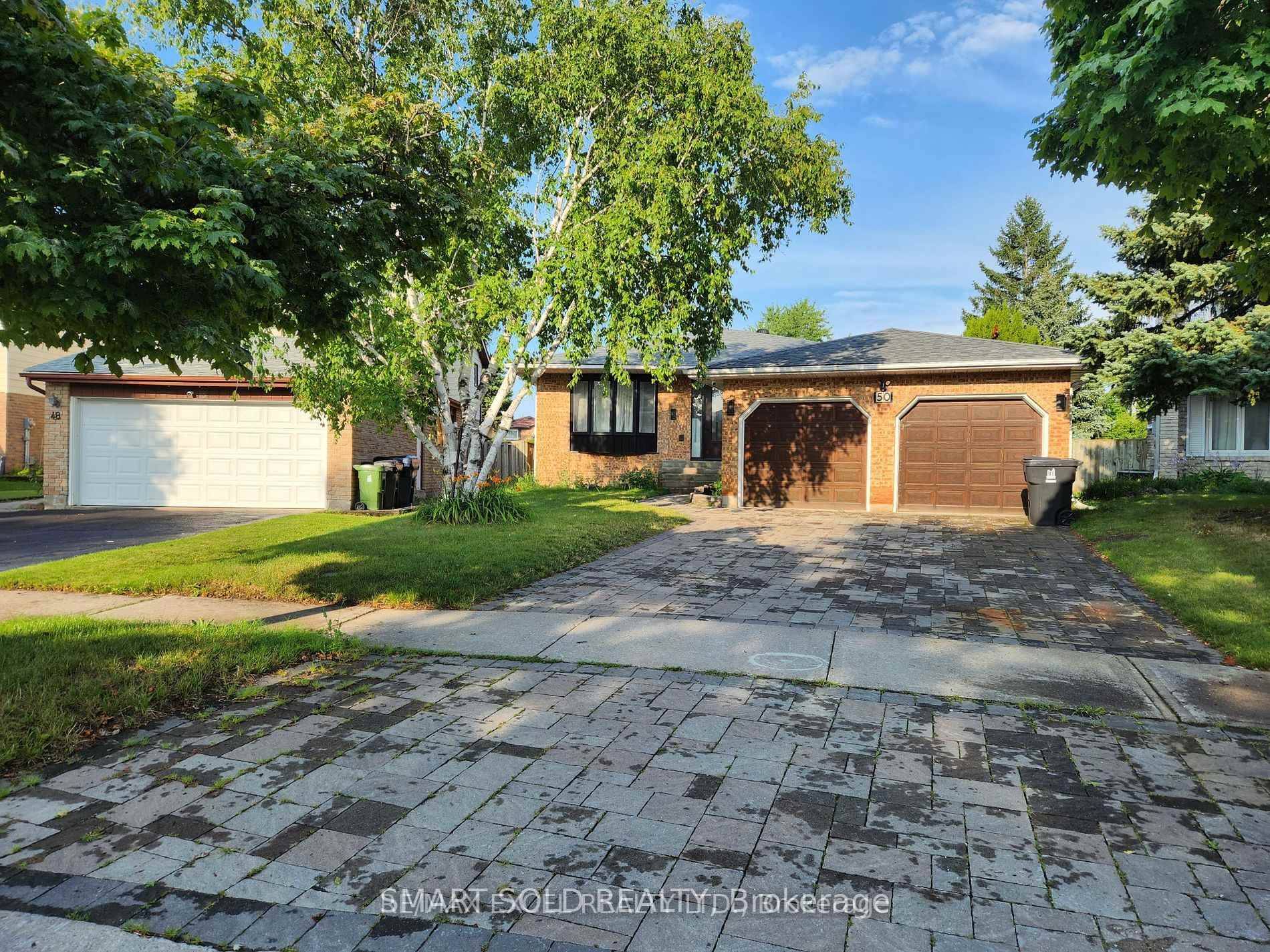 Basement lower unit at 50 Birdwood Ct, Lower A completely renovated with private entrance, open concept modern kitchen dining living area, 3 bedrooms, 3 full bathrooms glass showers and ensuite ...