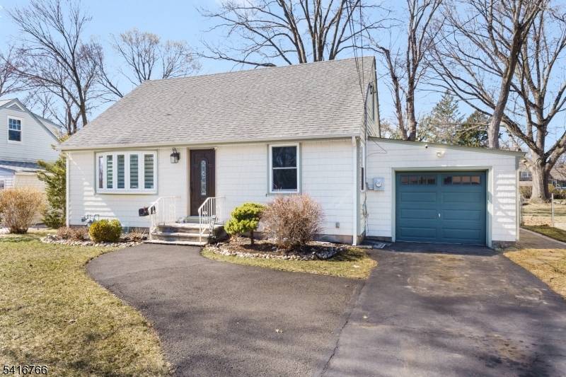 Welcome to this turn key, well kept cape cod in desirable South Plainfield, NJ.