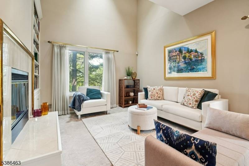 Welcome to this spacious and elegant townhouse in the prestigious Crystal Woods community of West Orange, NJ.