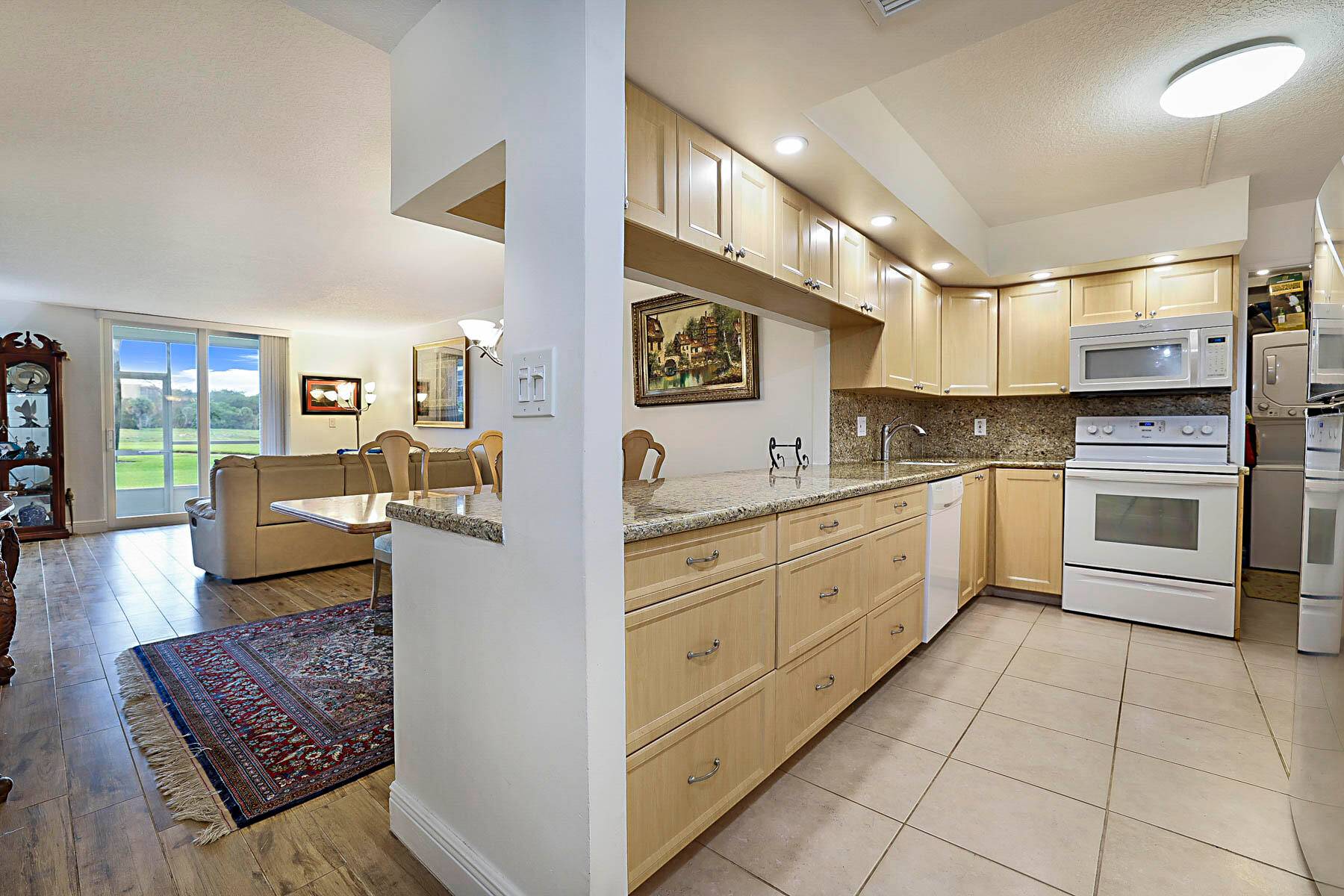 Welcome to this beautifully maintained all ages 2 bedroom, 2 bathroom which can be converted into a 3 bedroom first floor condo offering comfort, convenience and peace of mind.