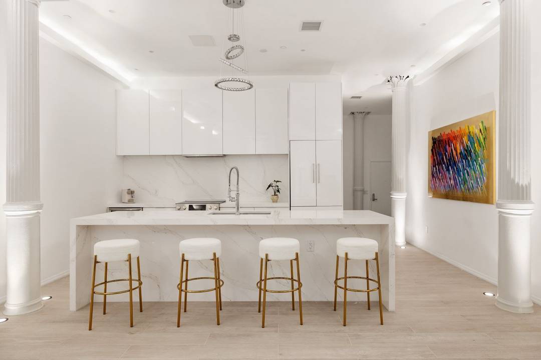 Welcome to this newly built 2024, impeccably designed loft with doorman on the most coveted block in SoHo.