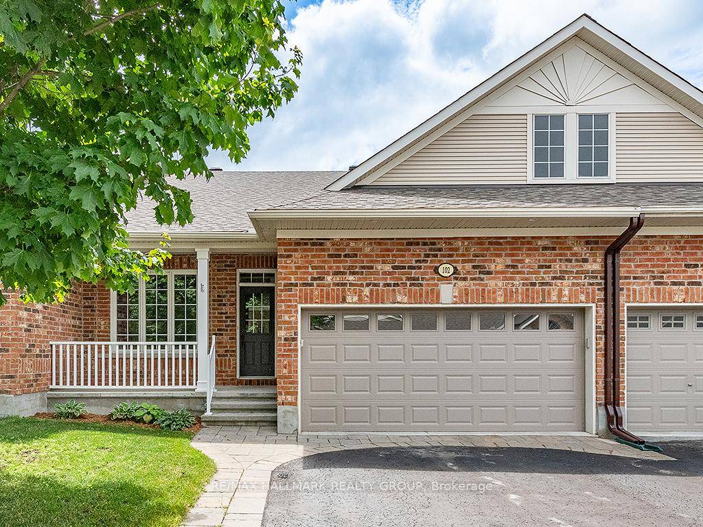 Sought after enclave of bungalow townhomes on a premium lot backing on golf course.