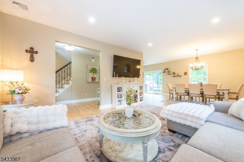 Welcome to this beautiful 4 bedroom, 2 1 2 bath Colonial nestled on approximately 2 private acres in desirable Riverdale !