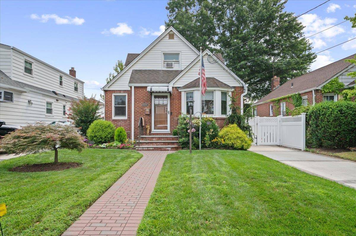 Step into this fully renovated expanded cape in the heart of Franklin Square !