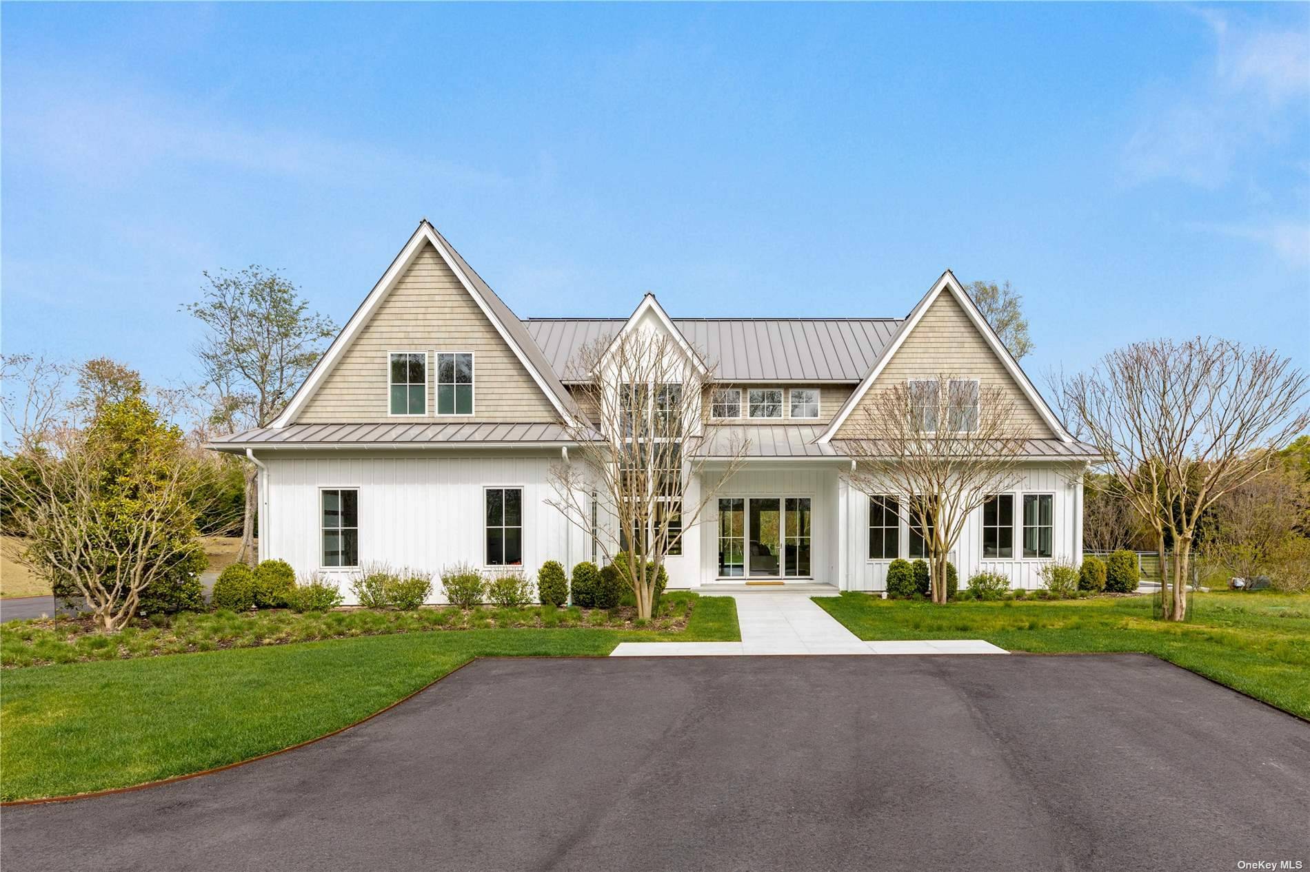 Welcome to a true masterpiece of luxury living in Sag Harbor, crafted by the esteemed Farrell Builders.