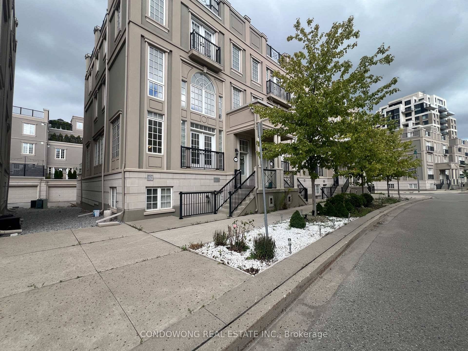 Luxurious end unit freehold townhome, featuring a private elevator and an expansive terrace in the heart of Downtown Markham.