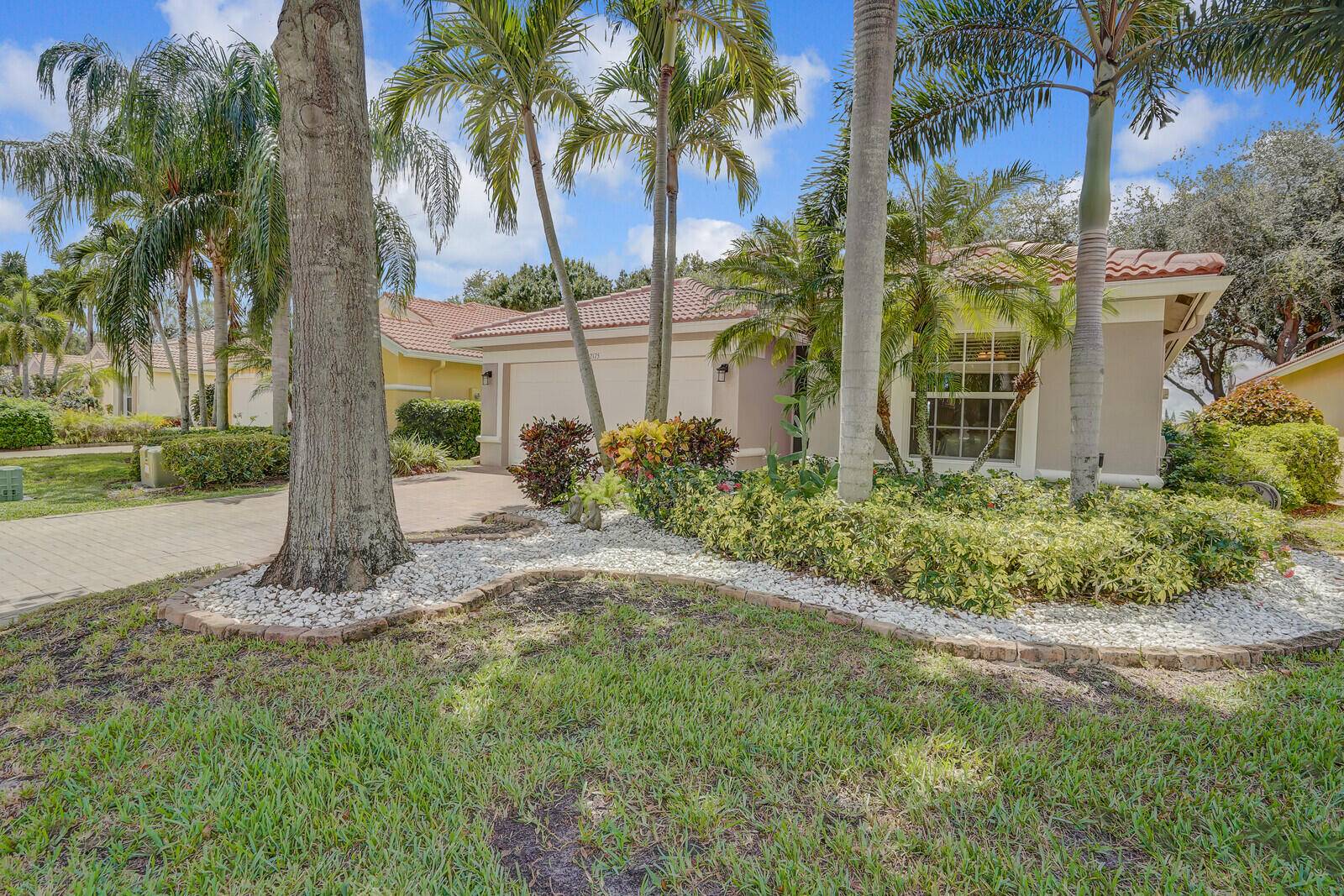 RARELY AVAILABLE EXTENDED GENOVA MODEL SET ON A BEAUTIFUL CANAL LOT WITH LAKE GOLF VIEWS.