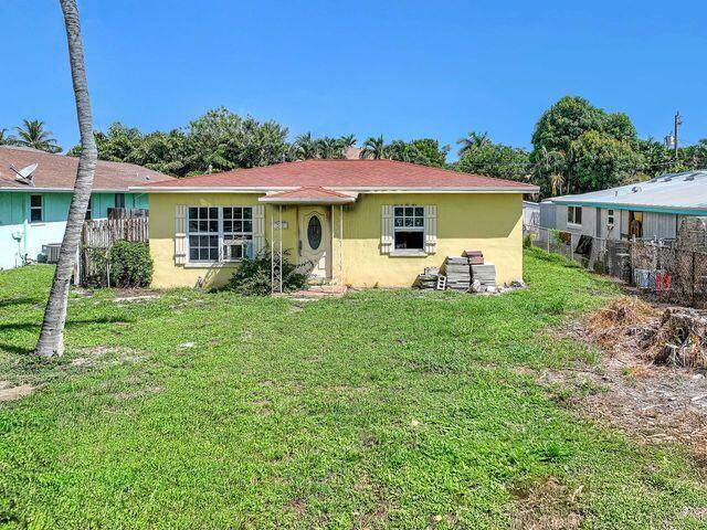 Prime buildable lot with uninhabitable existing homes just a few blocks from Atlantic Avenue and the beach.