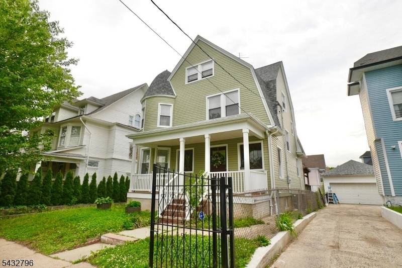 This exquisite Colonial, nestled in the heart of Newark's historic Forest Hill neighborhood, showcases timeless elegance, refined architectural details, and abundant old world charm.