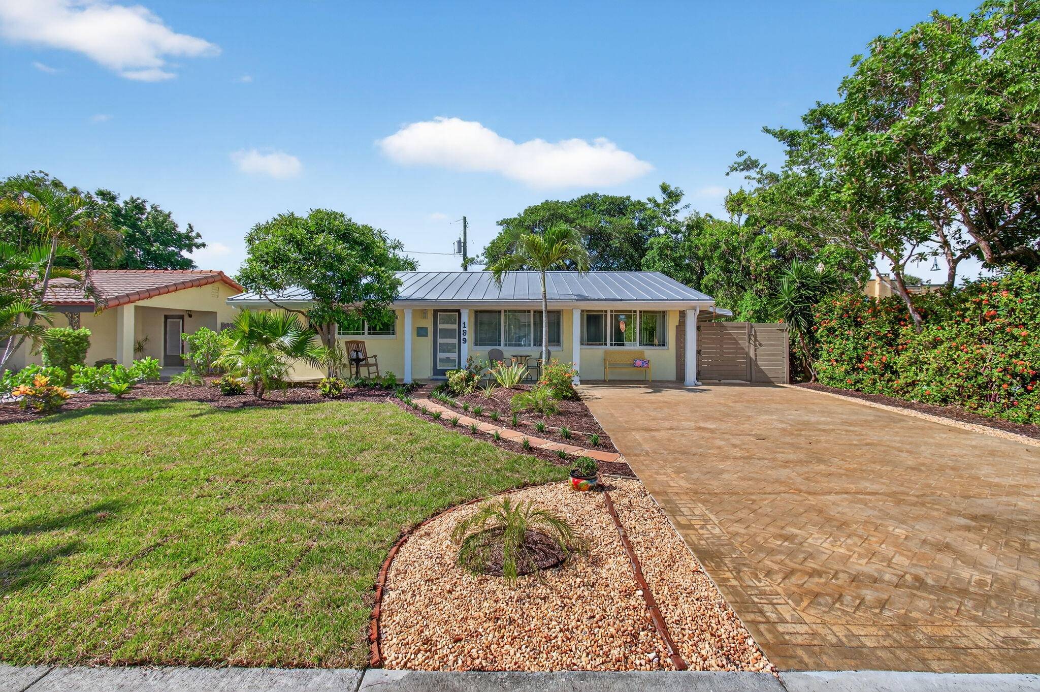Welcome to 189 Harvard Drive, nestled in the heart of Lake Worth Beach's College Park Historic District.
