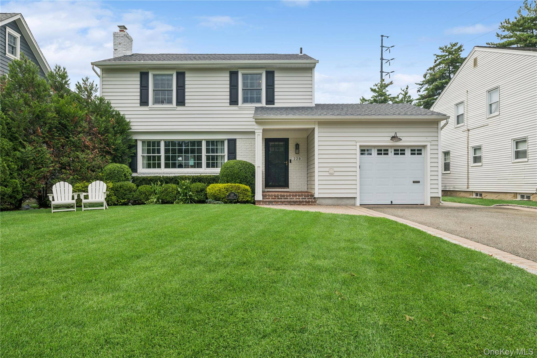 Welcome to 228 Kilburn Road, a beautifully renovated Colonial ideally located in the estates section of Garden City.