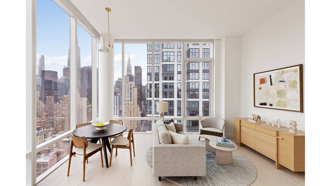 An Expansive Corner 2 Bedroom with a Sprawling Wrap Around Terrace, 14 Foot Ceilings amp ; Iconic City Views This rare corner 2 bedroom residence is defined by dramatic 14 ...