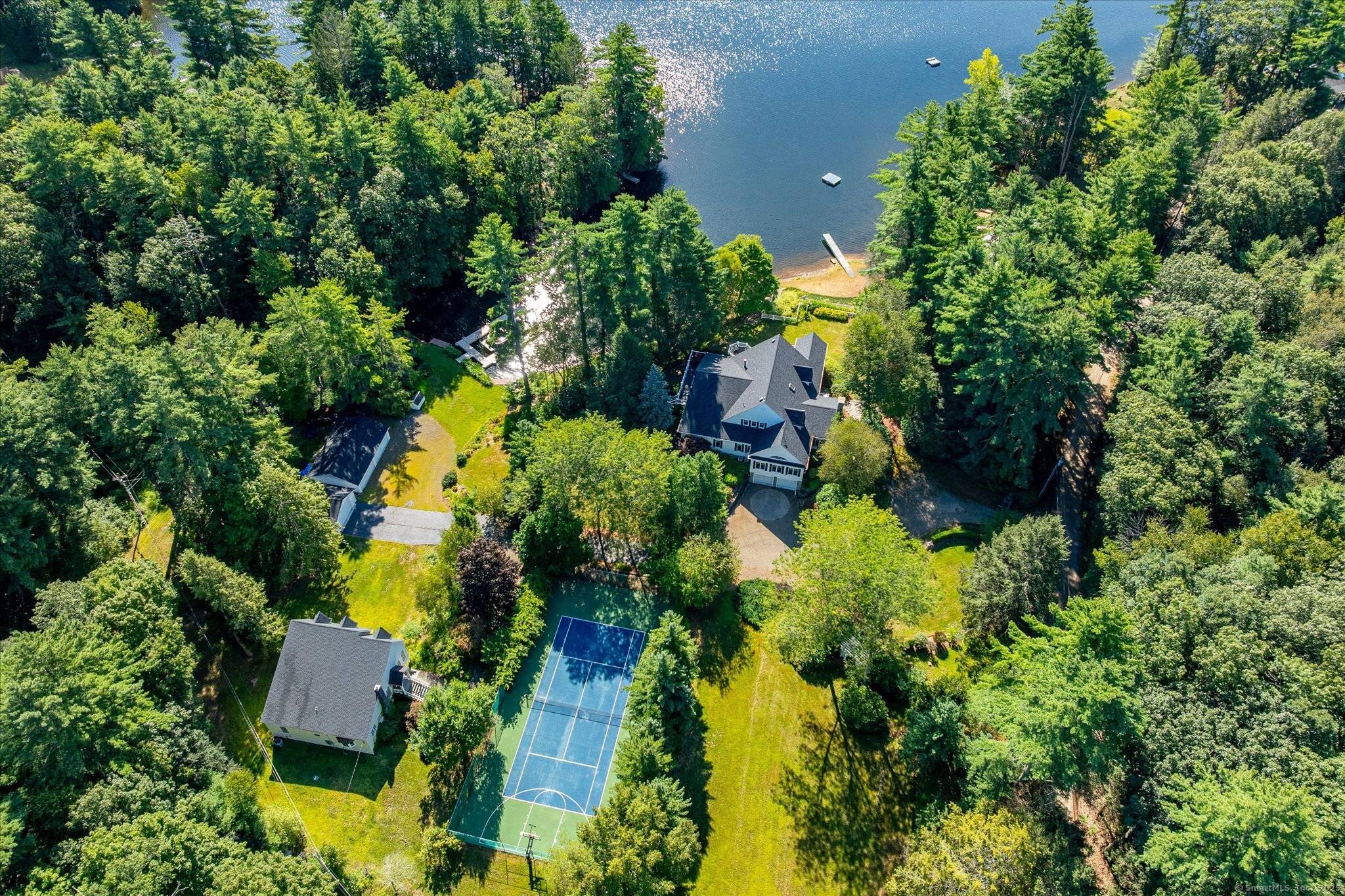 A rare lakefront estate on Lake Mashapaug, offering 5.