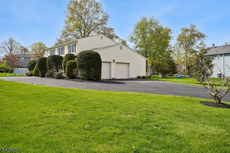 Bright, sunny Colonial offering 4 bedrooms, 2.