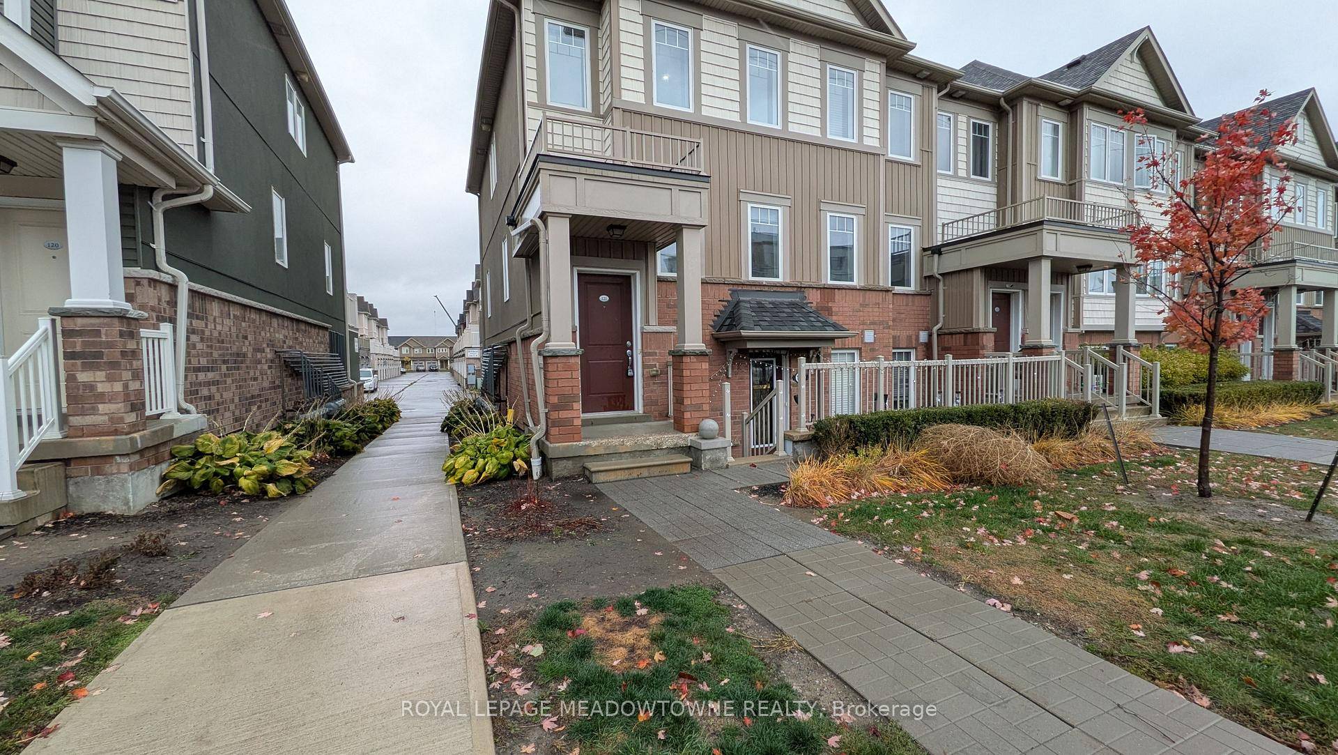 Welcome to this bright and modern end unit condo townhouse filled with natural light.