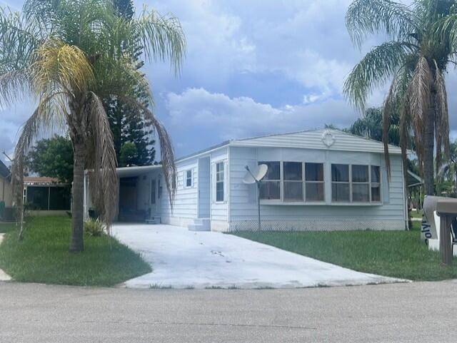Beautiful Corner Lot Home in Spanish Lakes Riverfront !