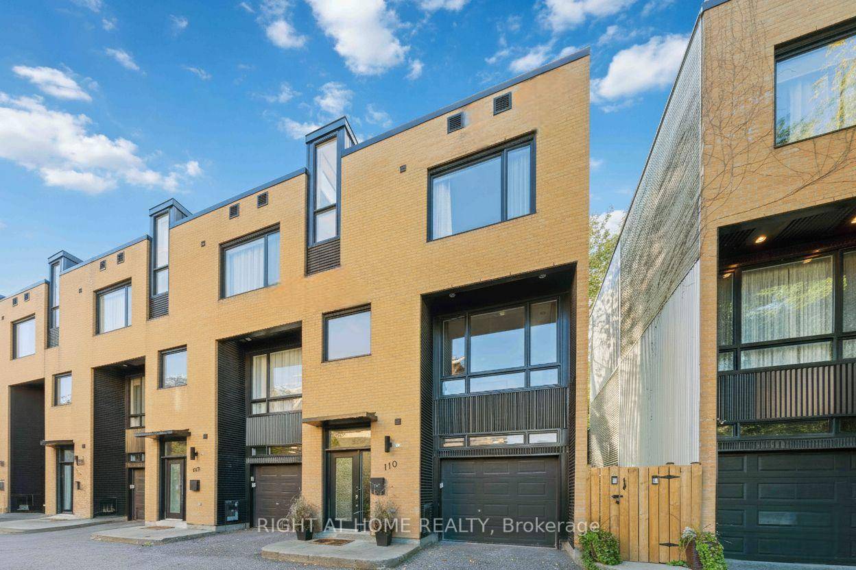 Tucked away on a quiet, private street in the heart of Lowertown, this luxurious end unit townhome blends modern style, natural light, and exceptional functionality across three spacious levels.