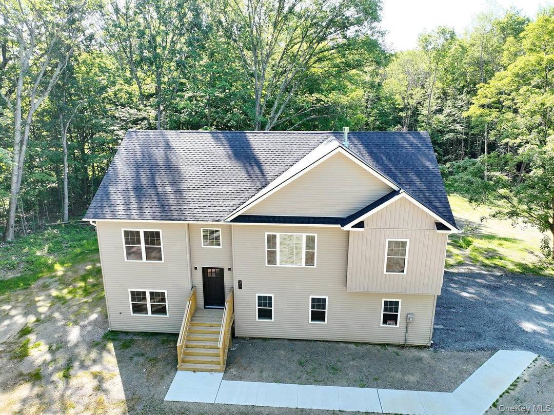 Discover a stunning blend of style and function in this brand new modern home perfectly sited on 3.