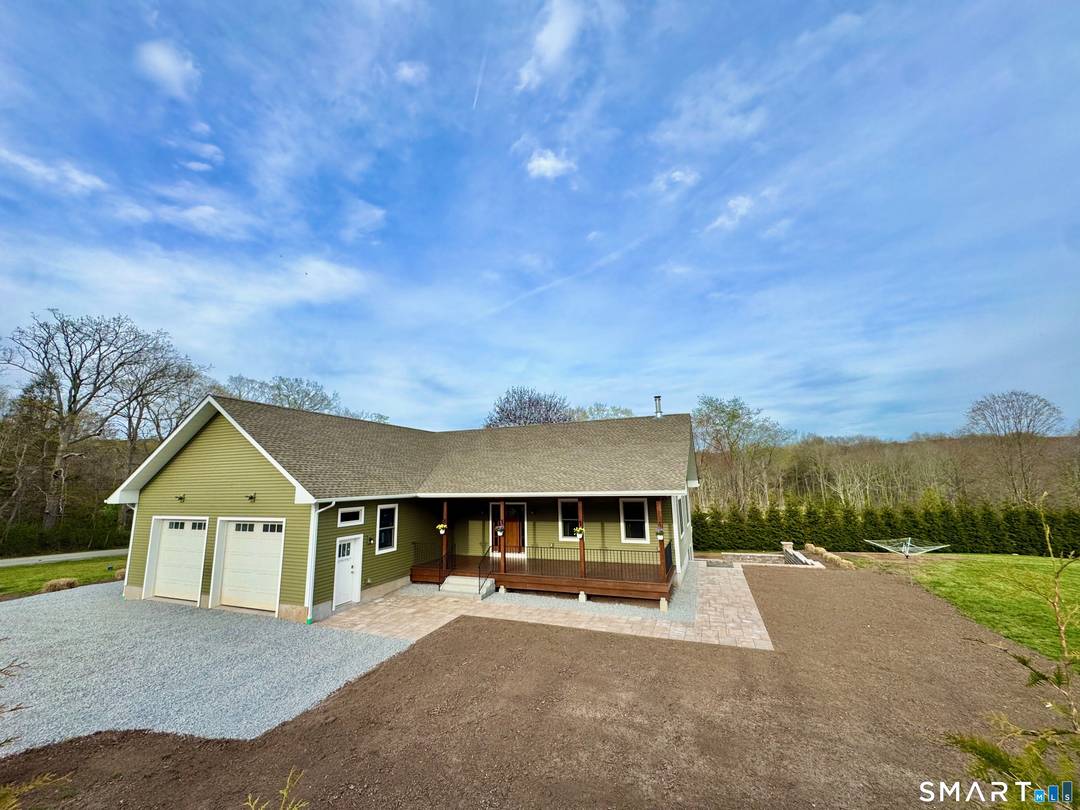 Built in 2021, this beautifully finished ranch sits on a quiet road in the heart of Moodus.