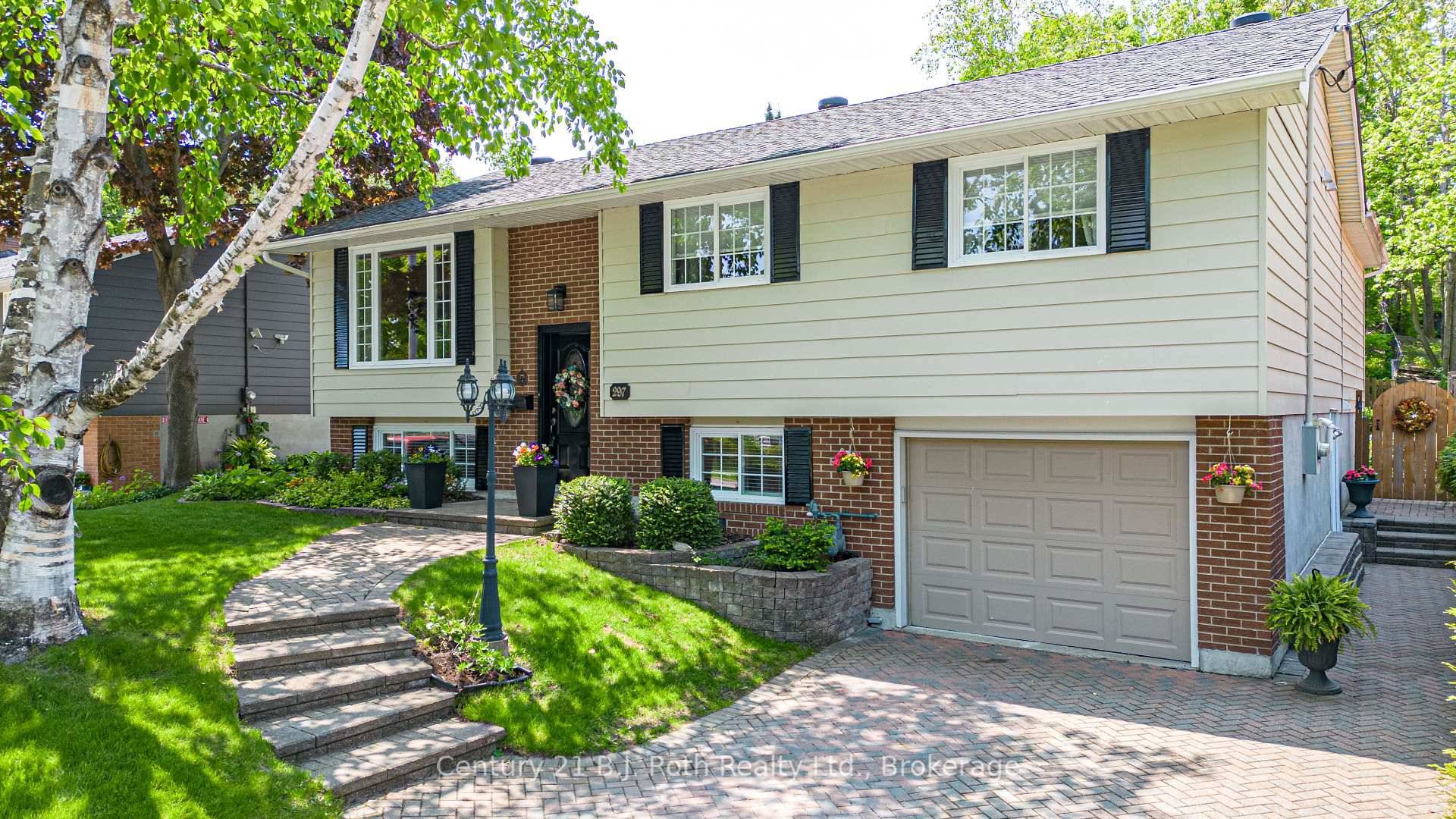 Welcome to this lovingly maintained raised bungalow, with over 3, 000 sq.
