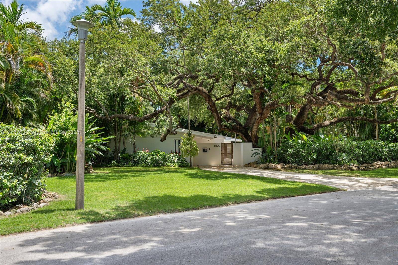 Discover a fully renovated 4 bed, 3 bath mid century modern masterpiece on a 12, 000 SF cul de sac lot in East Miami Shores.
