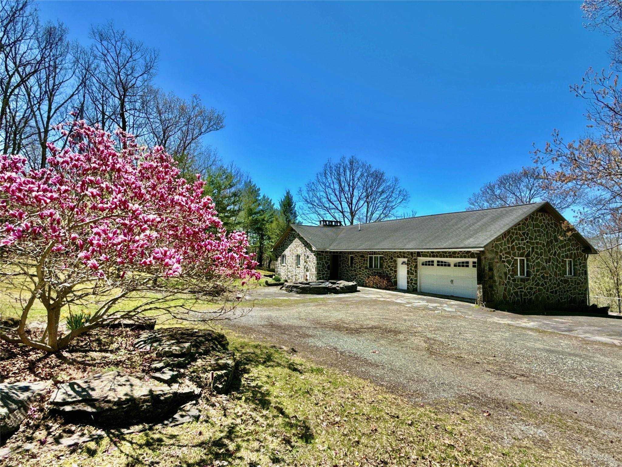 Set on an expansive 26. 14 acre SUB DIVIDABLE FOR ADDITIONAL INCOME parcel with breathtaking views of the Skinner's Falls Bridge and surrounding mountains, this charming stone faced ranch offers ...
