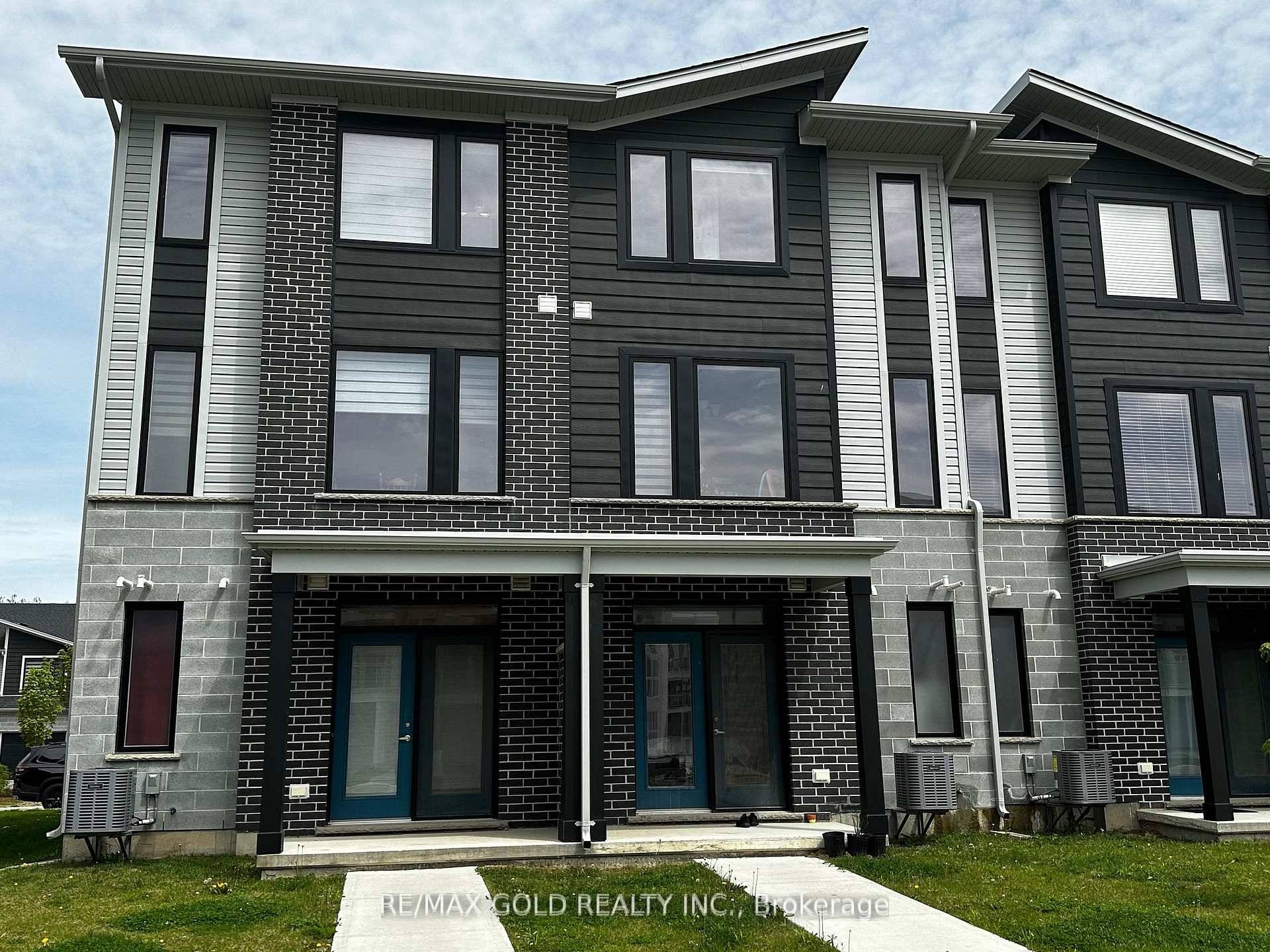 This stunning 3 bedroom plus main level den, 4 bathroom townhome showcases a perfect mix of modern style and functionality.