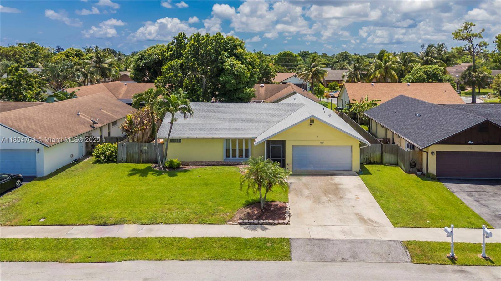 Charming 4BR 2BA single family home in Delray Beach with no HOA !