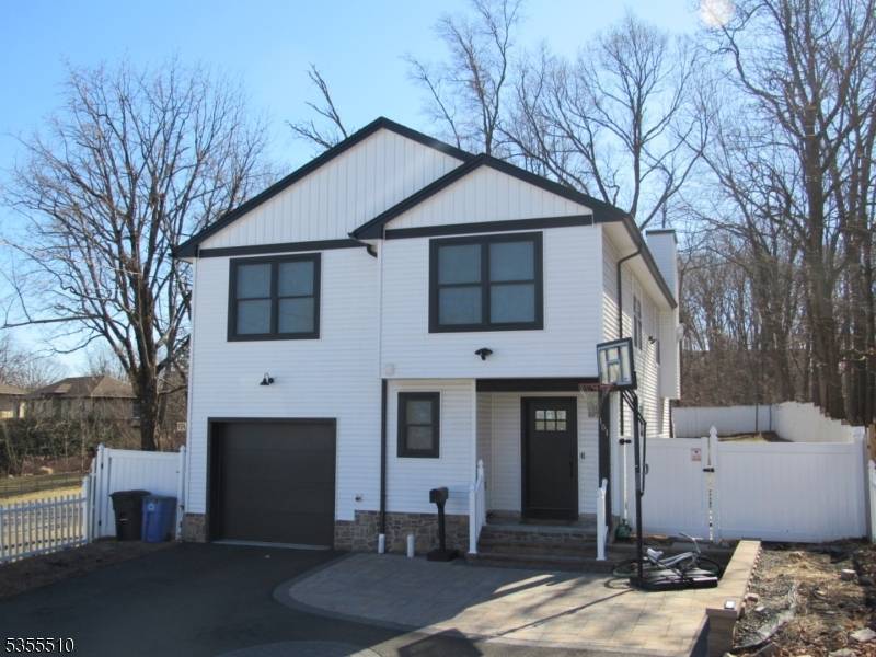 Custom built in 2022 with public sewer, water and gas while conveniently close to major highways for easy commuting.